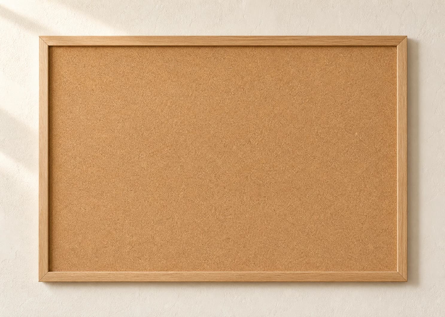 Oak framed corkboard filled with West Michigan discoveries
